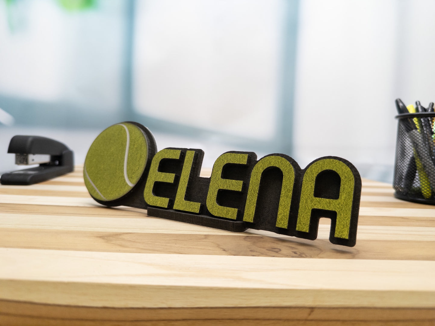 Side view of a personalized desk name plate featuring the name 'Elena' with a Tennis ball design, perfect for any Tennis enthusiast.