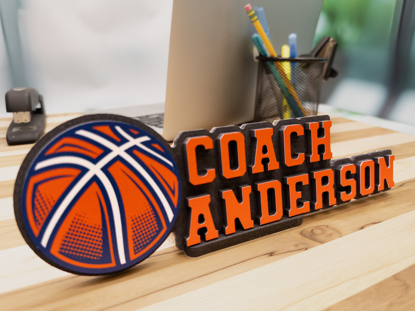 Custom desk sign for Coach Anderson with a basketball theme, showcasing a vibrant basketball graphic.