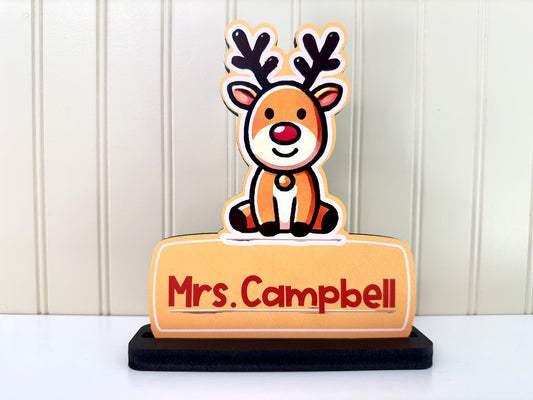 Closeup of a reindeer desk sign - nameplate, showcasing festive holiday design.